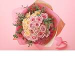 Elegant hand-tied bouquet mainly with roses